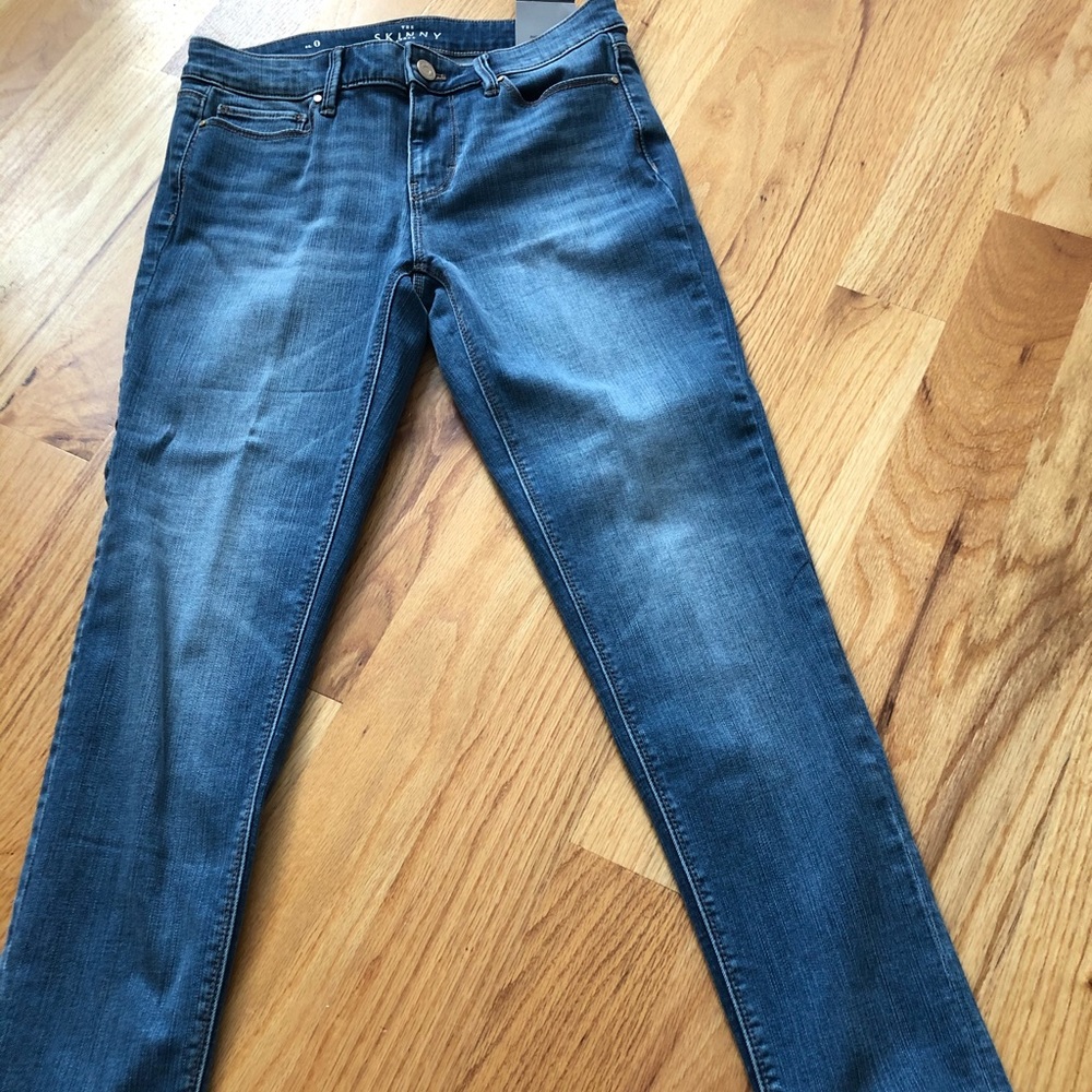 WHBM denim jeans with lace ankle trim. NWT. Size 0